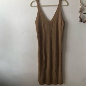 Sleeveless slim-fitting beige, dress.